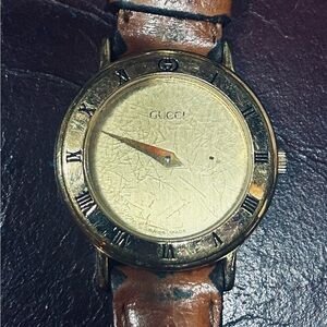 Gucci Gold Watch with Brown Leather Strap